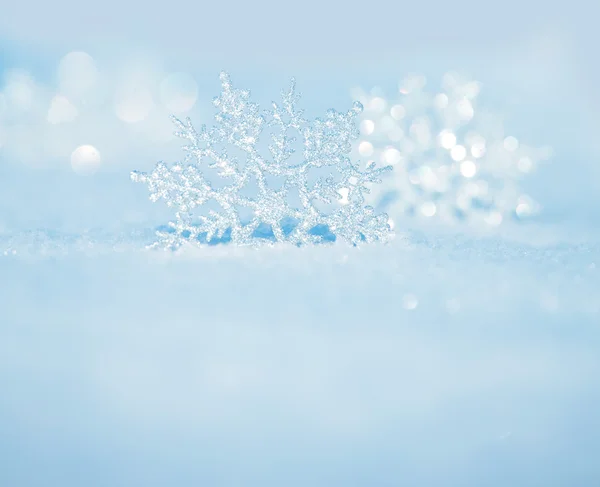 Snowflakes on snow — Stock Photo, Image