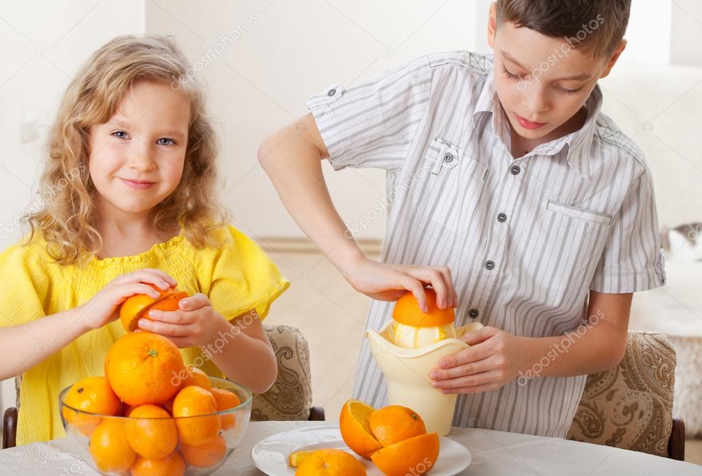 Children with oranges