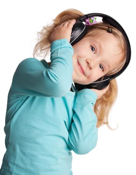 Menina em fones de ouvido — Fotografia de Stock