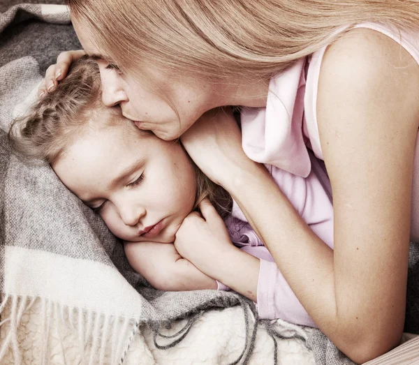 Parent touching forehead child — Stock Photo, Image