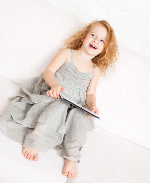 Baby with tablet computer — Stock Photo, Image