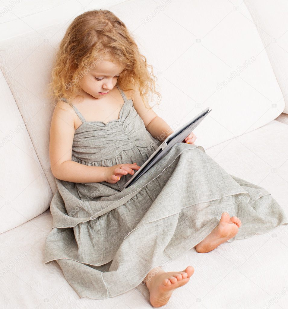 Baby with tablet computer