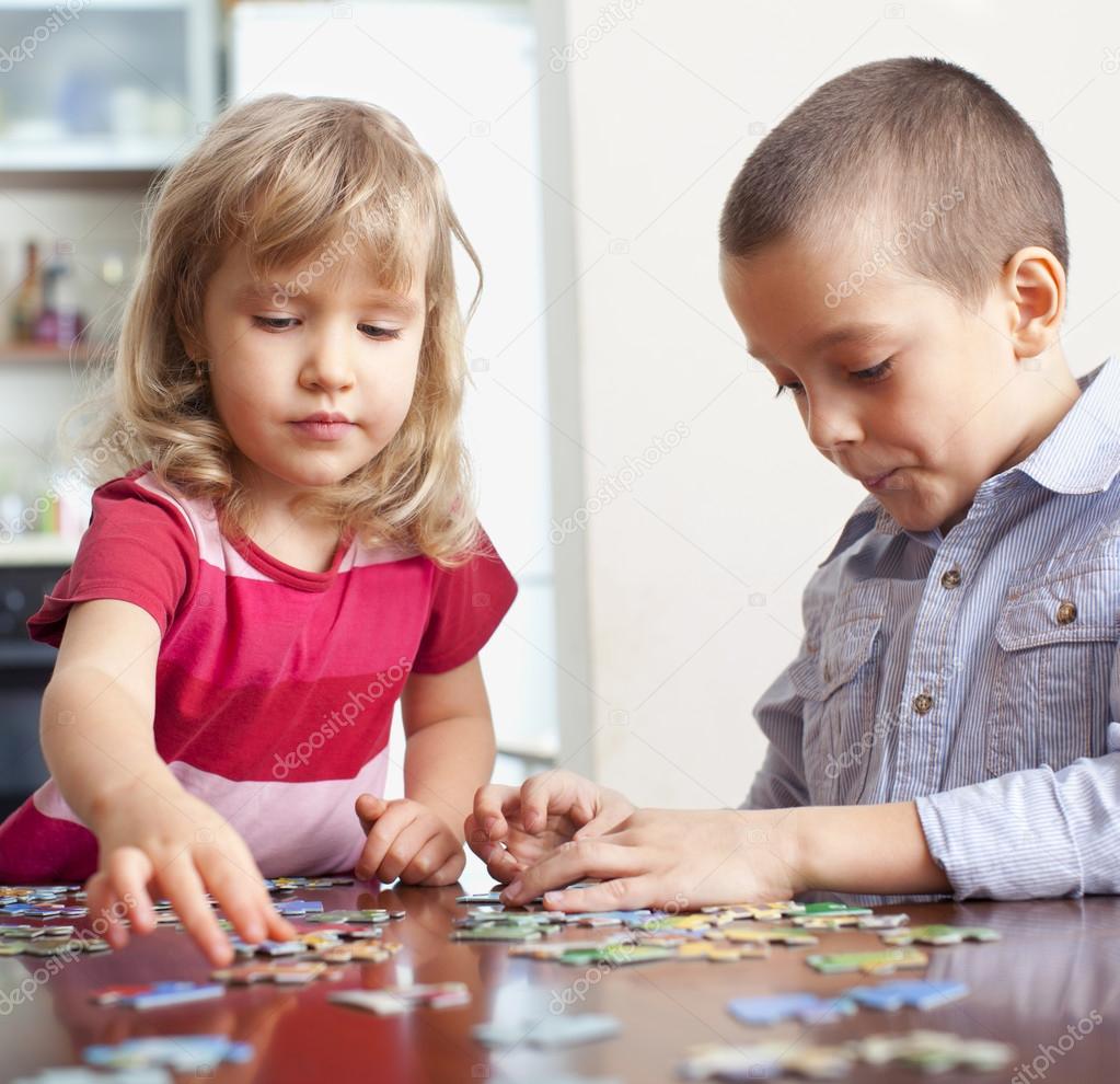 Children, playing puzzles
