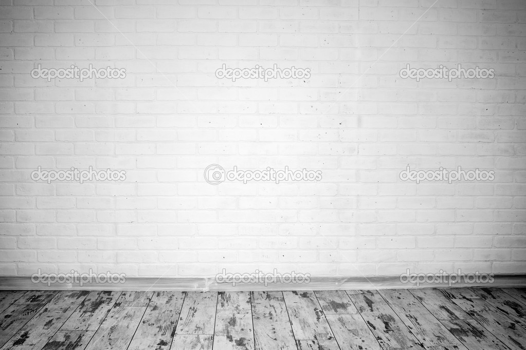 Empty room with brick wall