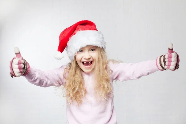 Criança em chapéu de Natal — Fotografia de Stock