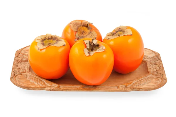 Persimmon on a plate — Stock Photo, Image