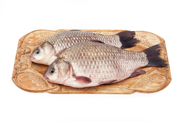 Crucian on a plate — Stock Image Crucian on a plate Stock Picture