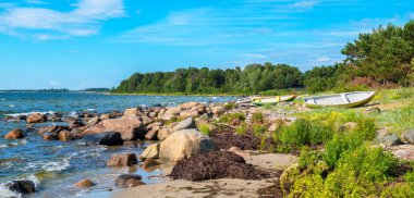 Panoramic view of Baltic Sea coast with fishing boats. Kaberneeme, Estonia, Europe