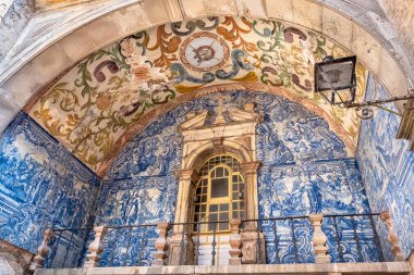 View to Azulejo and decorated ceiling of Porta da Vila the main entrance to medieval Obidos, Portugal clipart