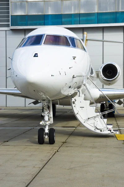 Private Jet in hangar — Stock Photo, Image