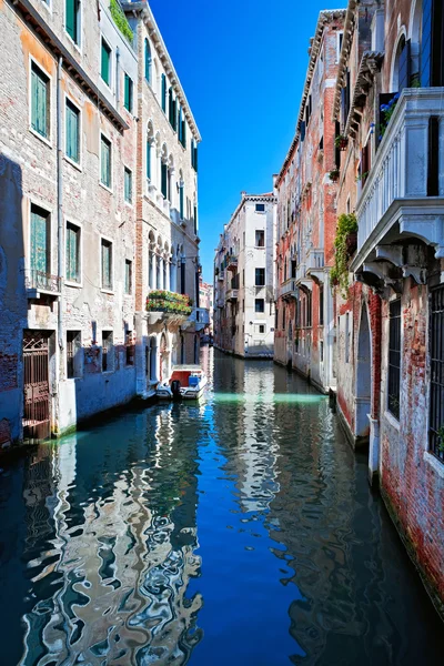 View of colored venice canal with houses standing in water — Stock Photo, Image