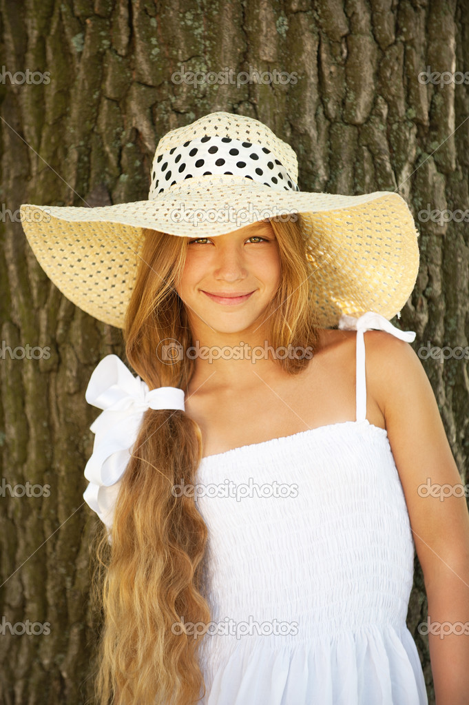 beautiful teenage in wide-brimmed hat