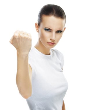 young woman close-up threatens fist into camera clipart