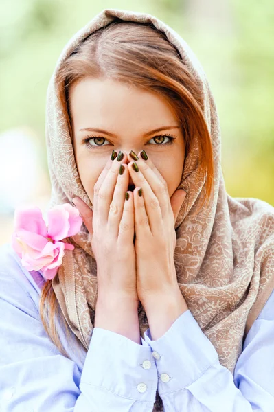 Young woman covered her hands — Stock Photo, Image