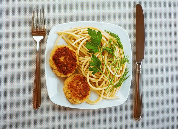 Burgers, pasta and parsley — Stock Photo, Image