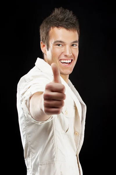 Handsome man raises up thumb — Stock Photo, Image