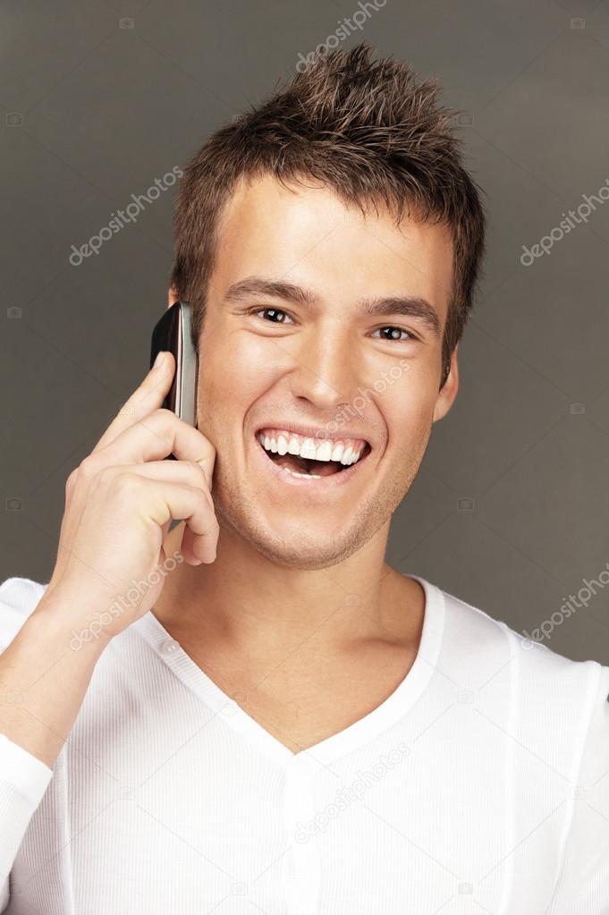 handsome man calls by telephone