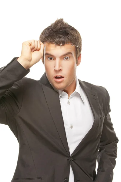 Young man is surprised with glasses — Stock Photo, Image