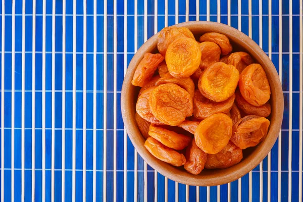 Plate with dried apricots — Stock Photo, Image