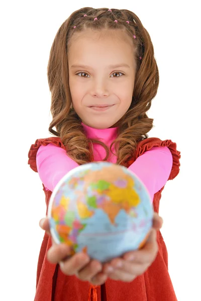 Smiling little girl in red dress with globe — Stock Photo, Image