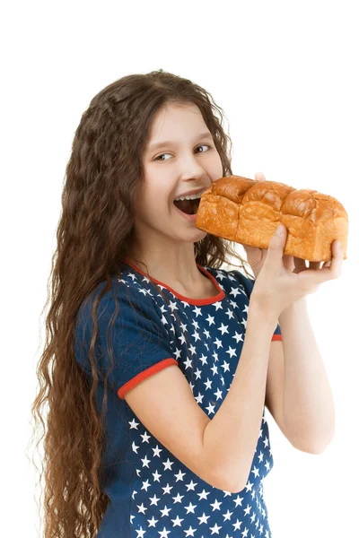 Estudante mordendo fora pedaço de pão — Fotografia de Stock