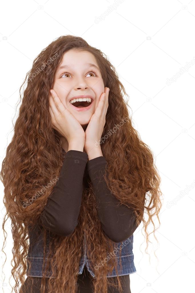 surprised schoolgirl with dark curly hair