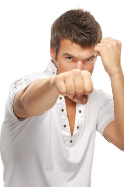 close-up portrait of young man holding fists clipart