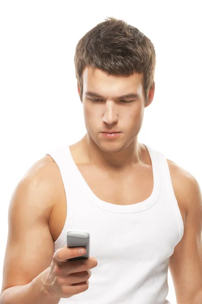 Young man with mobile phone — Stock Photo, Image