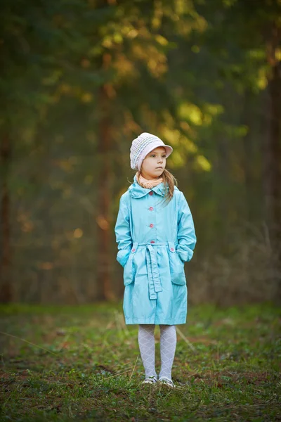 Little girl in blue coat — Stock Photo, Image