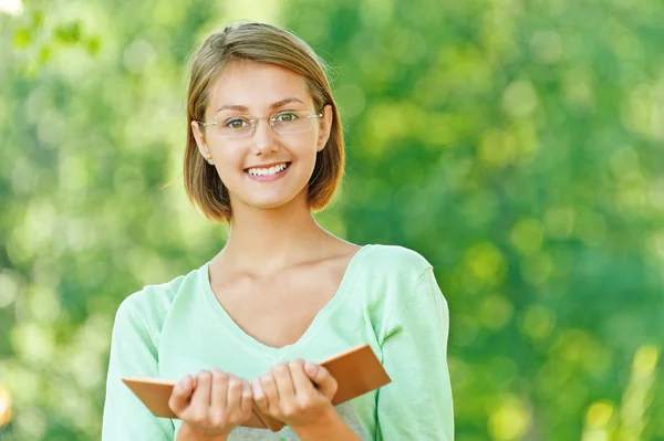 Young woman glasses read book — Stock Photo, Image