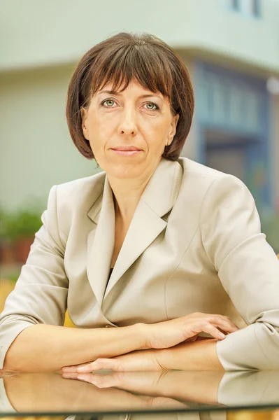 Beautiful businesswoman in bright suit — Stock Photo, Image