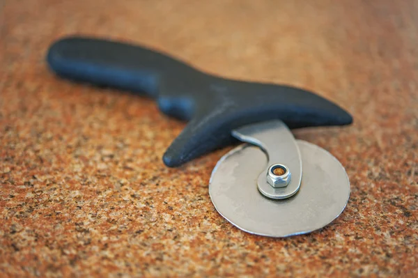 Knife for cutting pizza — Stock Photo, Image