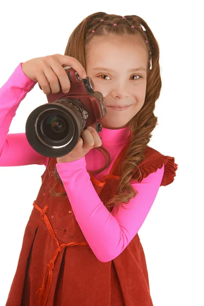 Niña sonriente en vestido rojo con cámara — Foto de Stock