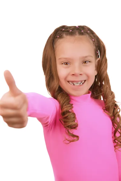 Veselá dívka zvedá palec nahoru — Stock fotografie