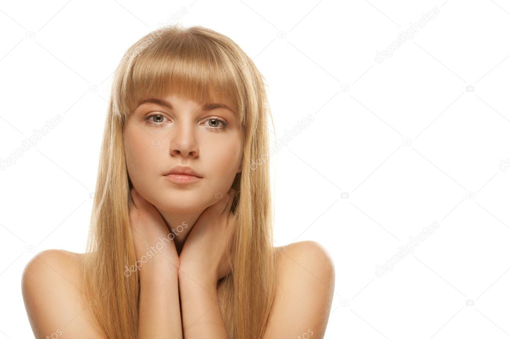 portrait of young blonde against white background