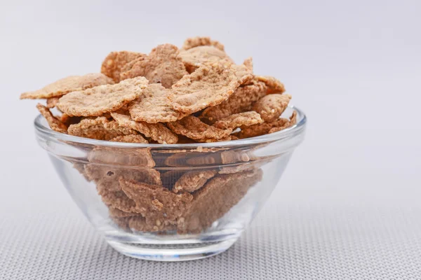 Wheat flakes for breakfast — Stock Photo, Image