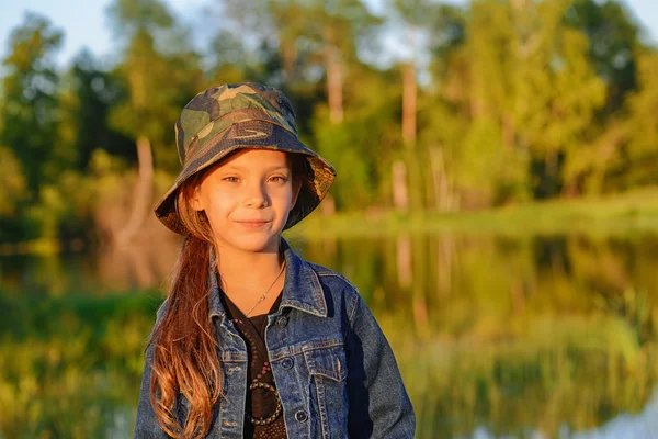 Little girl in military cap — Stock Photo, Image