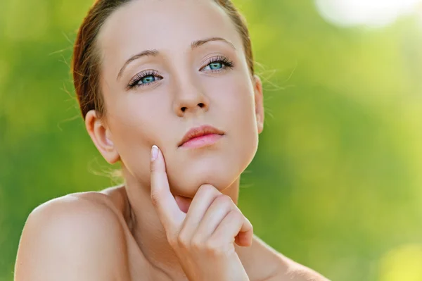 Portrait of pretty pensive young woman — Stock Photo, Image