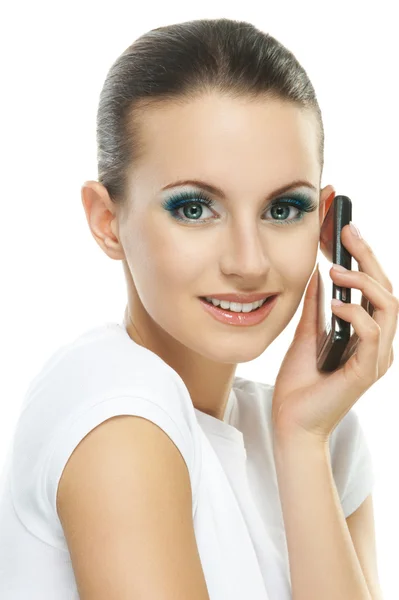 Portrait of young woman talking on telephone — Stock Photo, Image