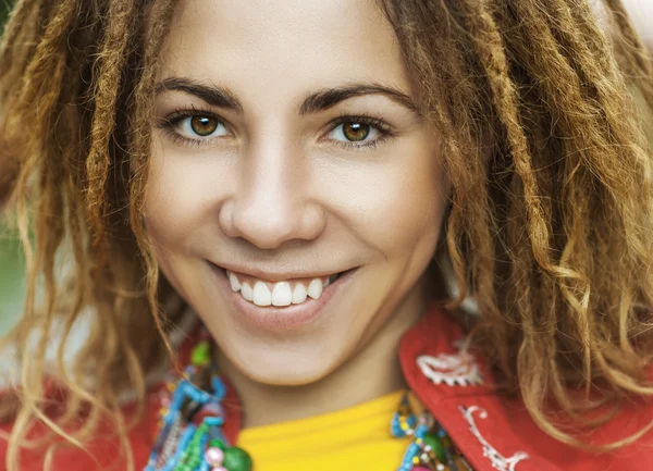 Beautiful woman with dreadlocks — Stock Photo, Image