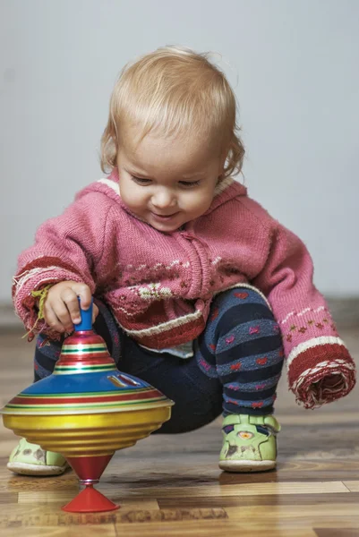 Bambina con peg-top — Foto Stock