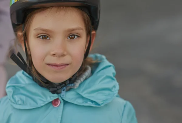 Little girl in blue jacket — Stock Photo, Image