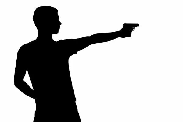 Young man took aim with pistol — Stock Photo, Image