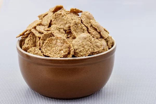 Wheat flakes for breakfast — Stock Photo, Image