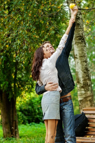 Girl and young man are played — Stock Photo, Image