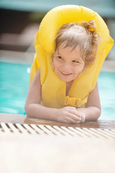 Little girl in inflatable waistcoat — Stock Photo, Image