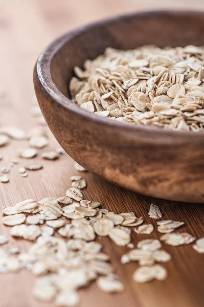 Oat flakes in bowl — Stock Photo, Image