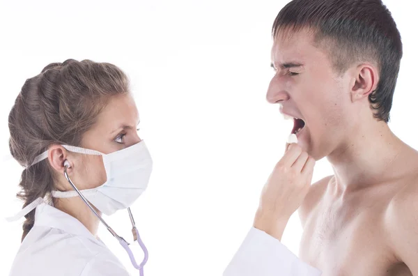 O médico e o paciente em um fundo branco — Fotografia de Stock