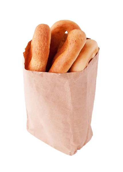 Tre bagels i en brun papperspåse — Stockfoto