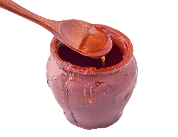 Clay pot with honey — Stock Photo, Image